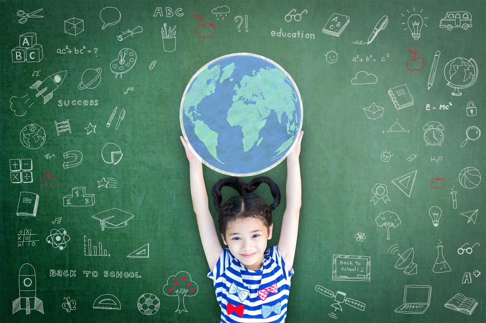 Student Holding a Globe 