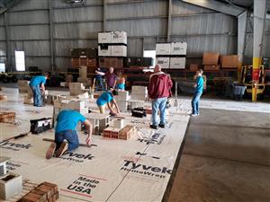 Students creating benches in Masonry class 