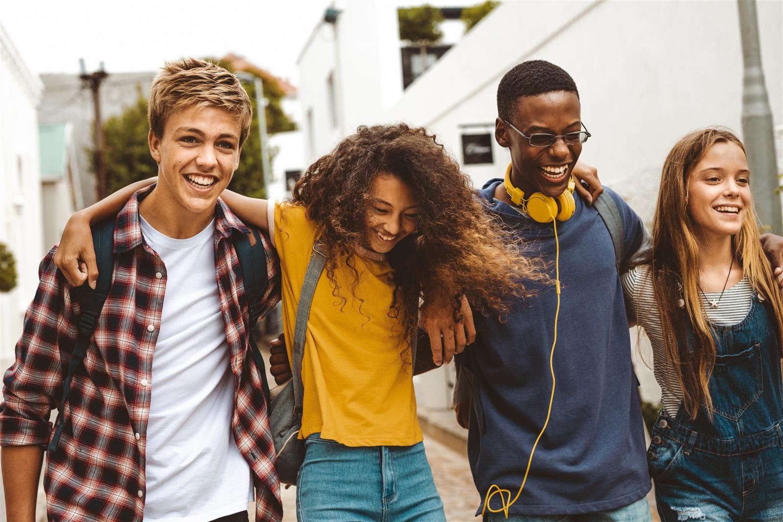 Students gathering and smiling